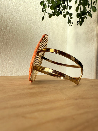 Brazalete concha coral acero y rafia